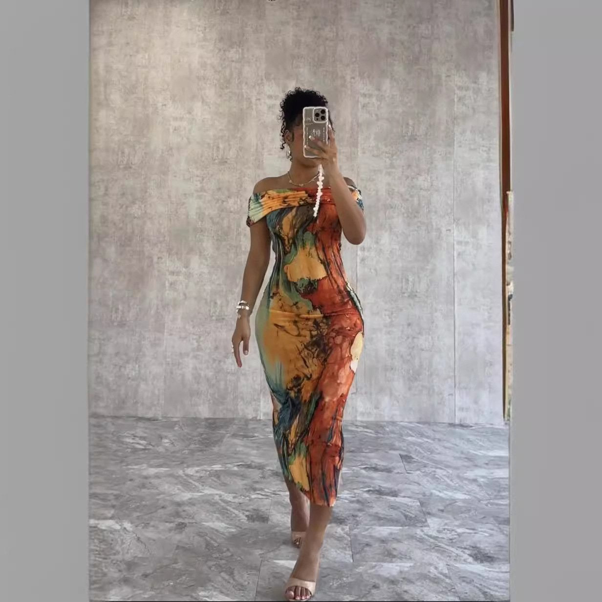 Variegated one-shoulder fashion statement dress